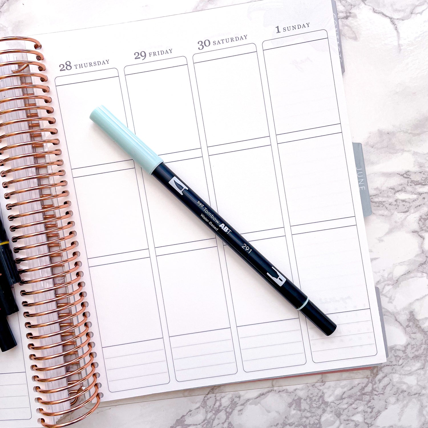 Tombow Brush Pen Testing in 8 Different Bullet Journals – All About Planners